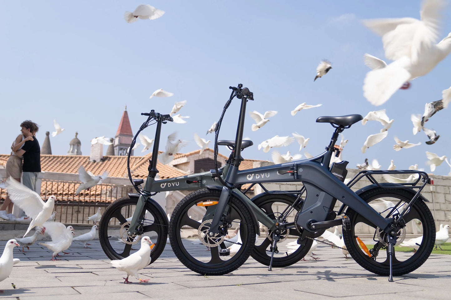DYU T1 20 Inch Foldable Electric Bike with magnesium alloy frame and 36V10AH high-integrated Battery parked outdoors