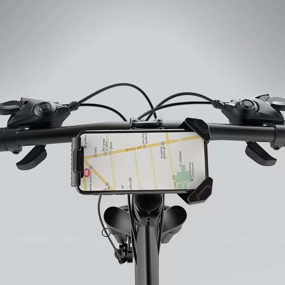 Shengmilo bike handlebar phone mount securely holding a smartphone on black bicycle handlebars