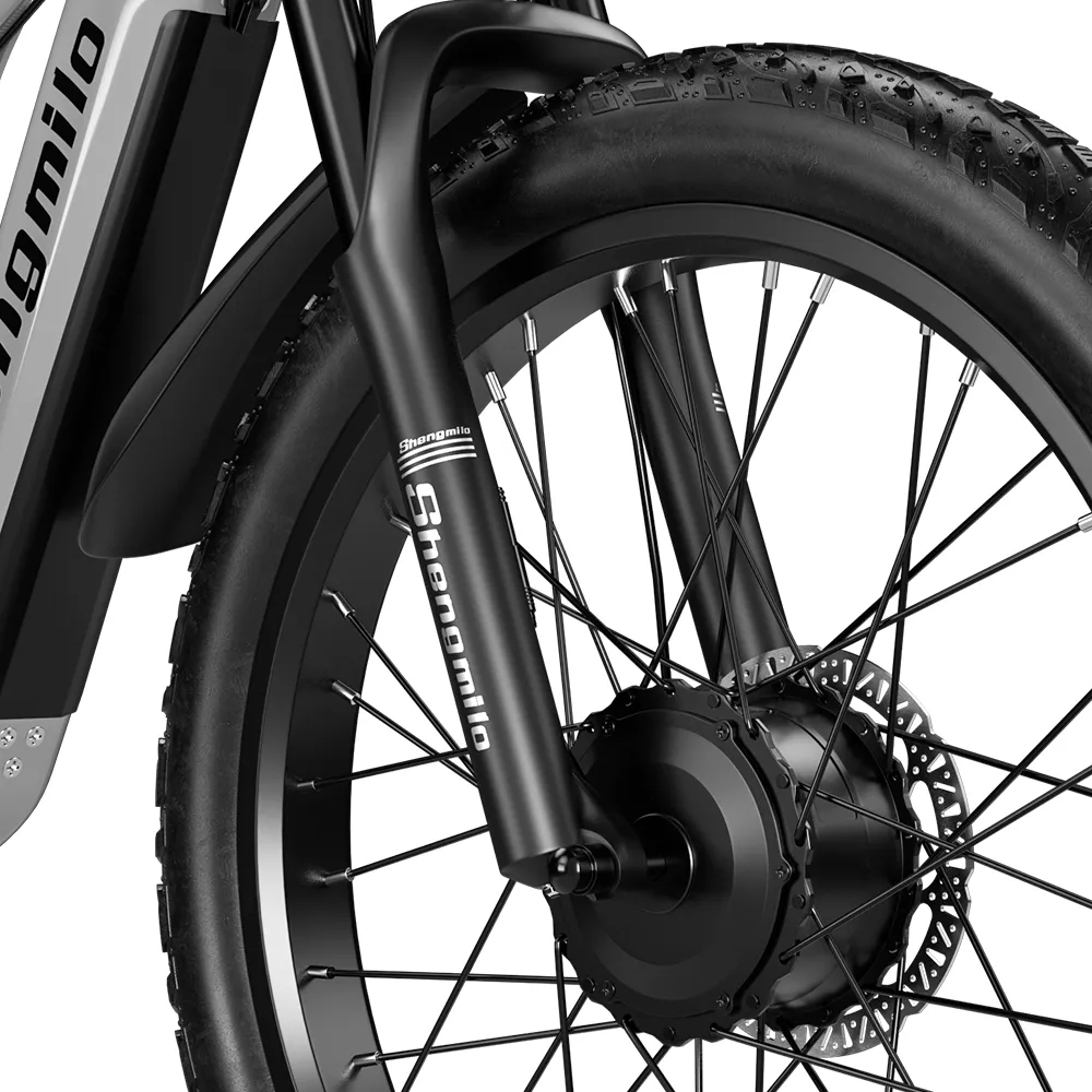 Close-up of Shengmilo S600 front electric bike wheel with 2000W dual motor and disc brake system