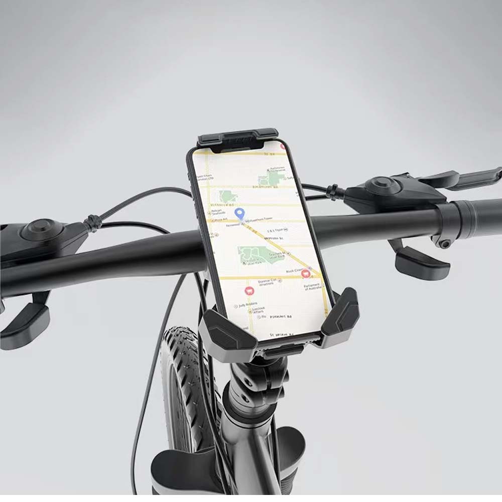 Shengmilo bike handlebar phone mount securely holding a smartphone displaying a map on a bicycle handlebar