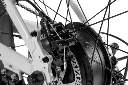 Close-up of Shengmilo MX06 Step Through E-bike rear disc brake and motor system with hydraulic oil brake and fat tires