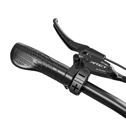 Close-up of Shengmilo S900 electric bicycle handlebar with hydraulic oil brake lever and textured grip