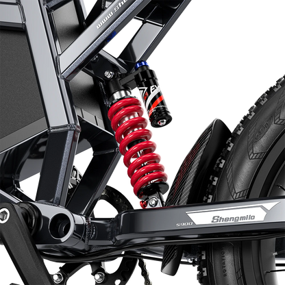 Shengmilo S900 Electric Bicycle rear suspension close-up showing red coil spring and mountain electric bike details